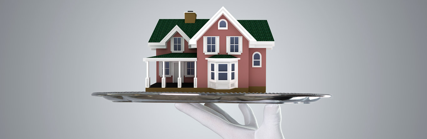 silver platter holding model home